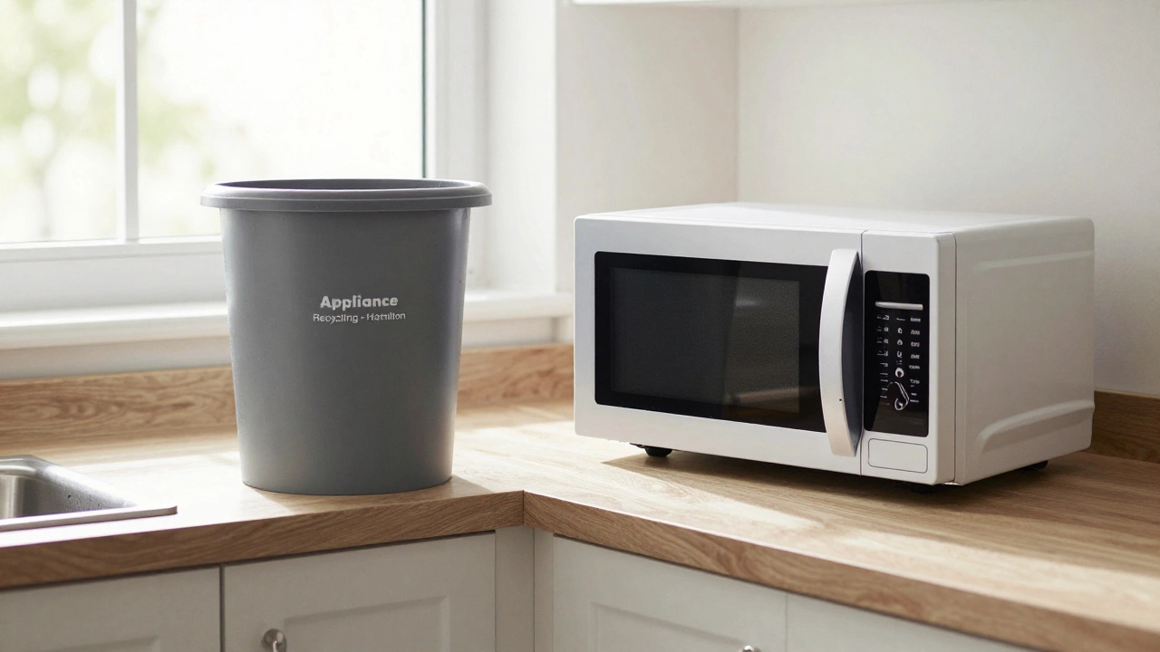 New microwave being unboxed beside old one going into recycling bin on kitchen counter.